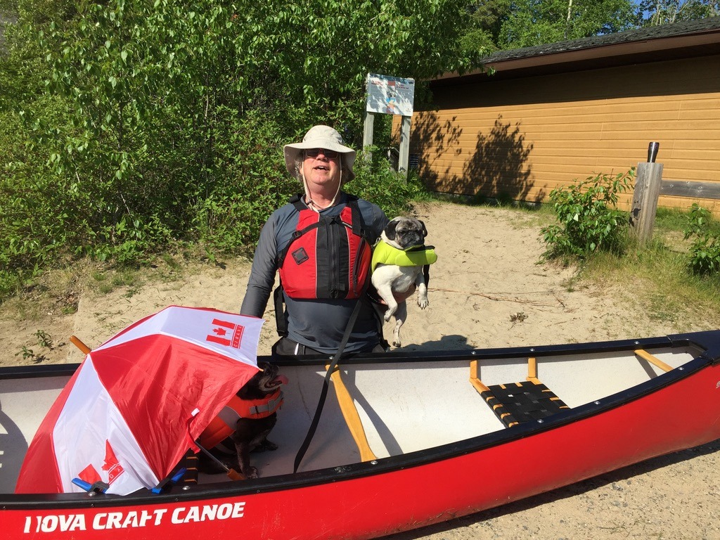 Larry pugs canoe